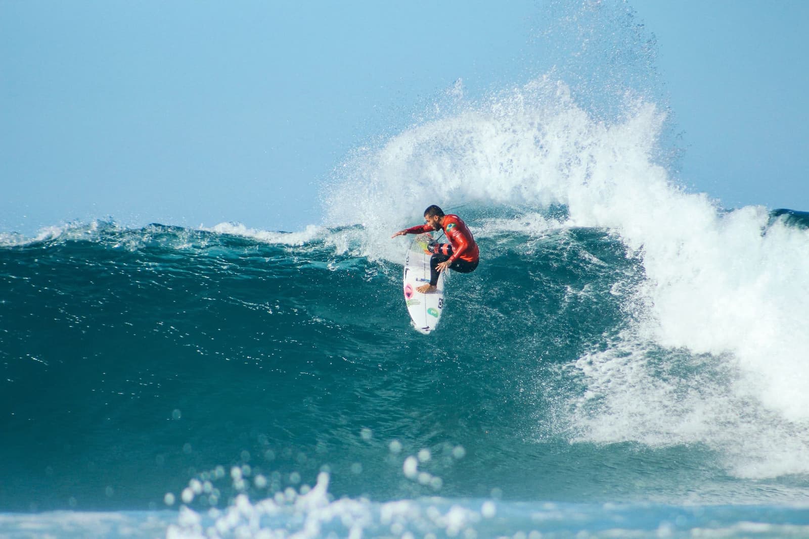 Long beach and surf break at Arugam Bay