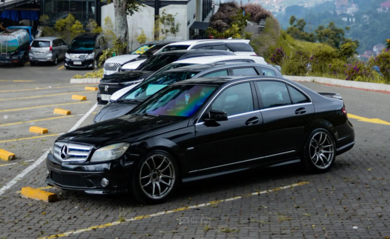 Air-conditioned touring SUV on a scenic mountain road in the Sri Lankan hills